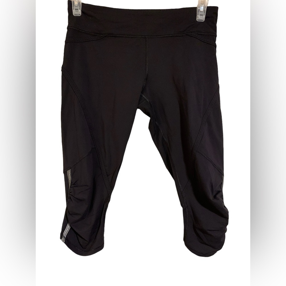 Lululemon Size 8 Ebb to Street Leggings Black Ruched Side Zip Back Pocket